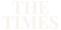 The Times in white uppercase font.